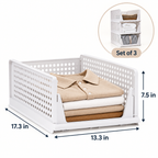 White plastic folding laundry basket shown with folded beige, white, and brown clothes inside, with dimension arrows indicating 17.3 in width, 13.